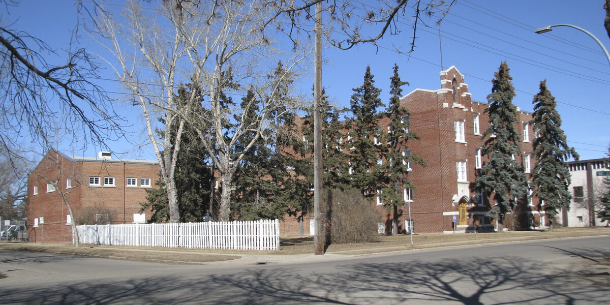 St. Anthony's Seraphic College, a red-brick 1925 building, seen from the southwest